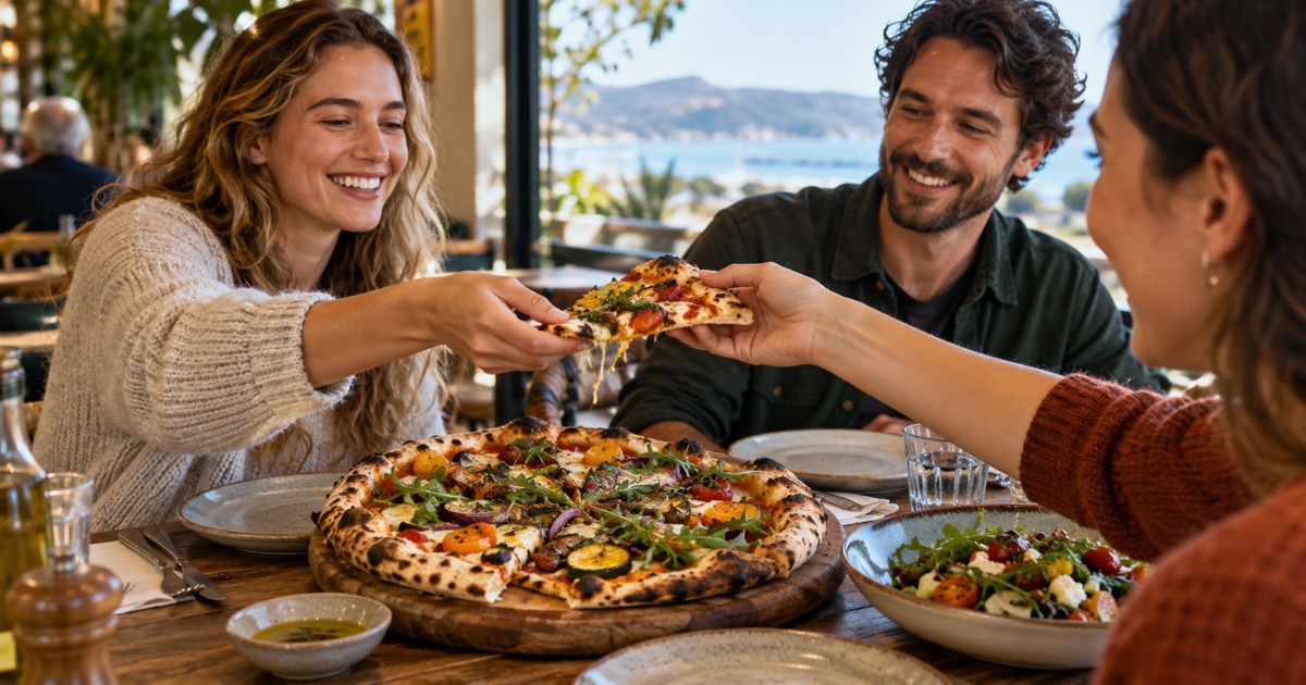 Fresh vegetarian pizza slice showing crisp vegetables melted cheese and an airy crust